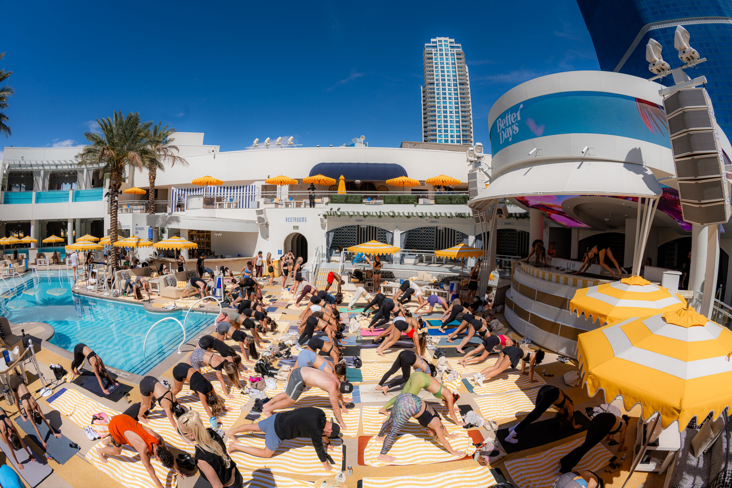Large poolside group fitness session at LIV Beach.